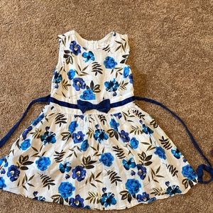 Little Handz white dress with blue flowers. Size 4